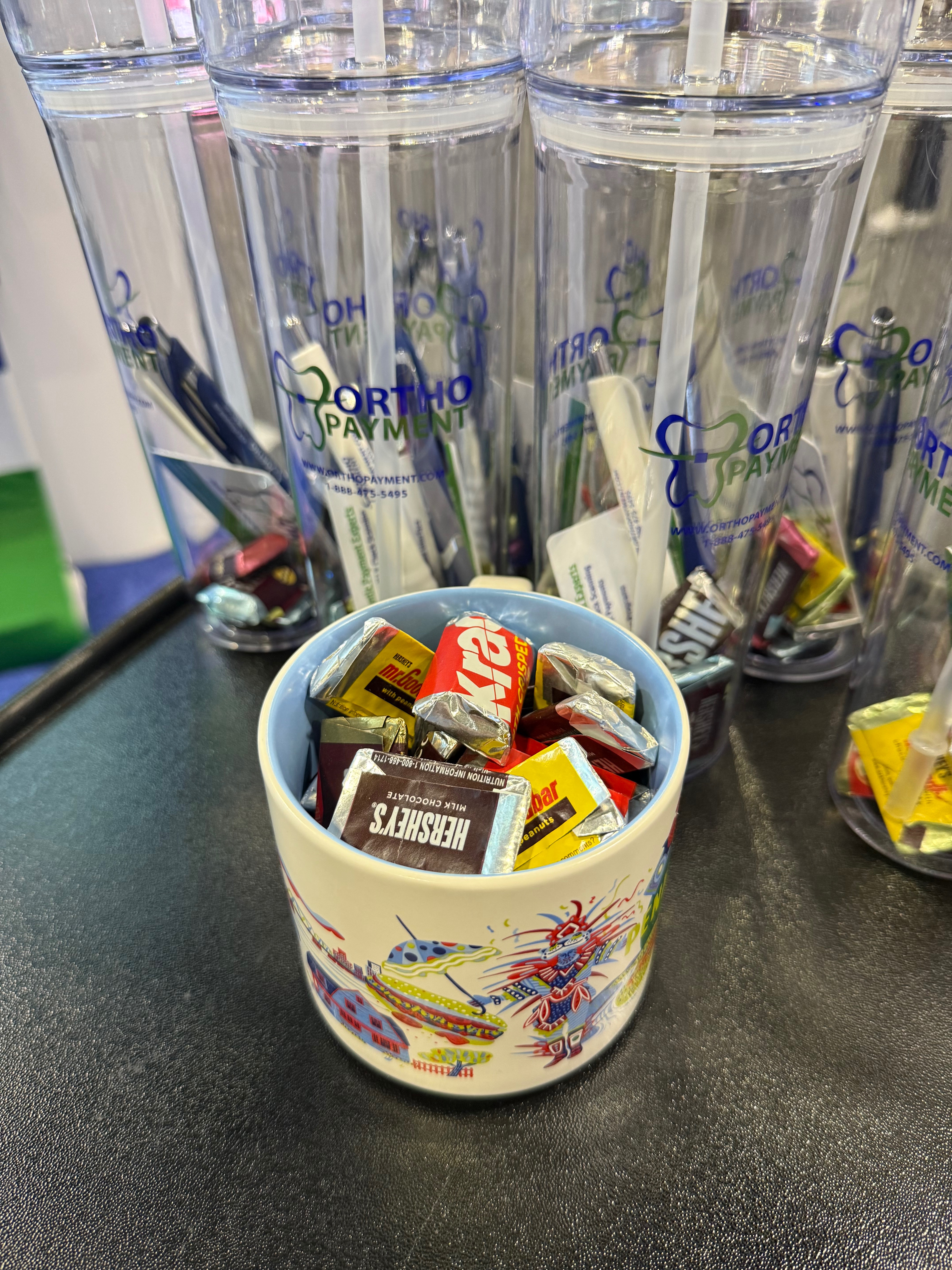 Get a cup of goodies and lower your merchant processing fees, Booth 3608 129