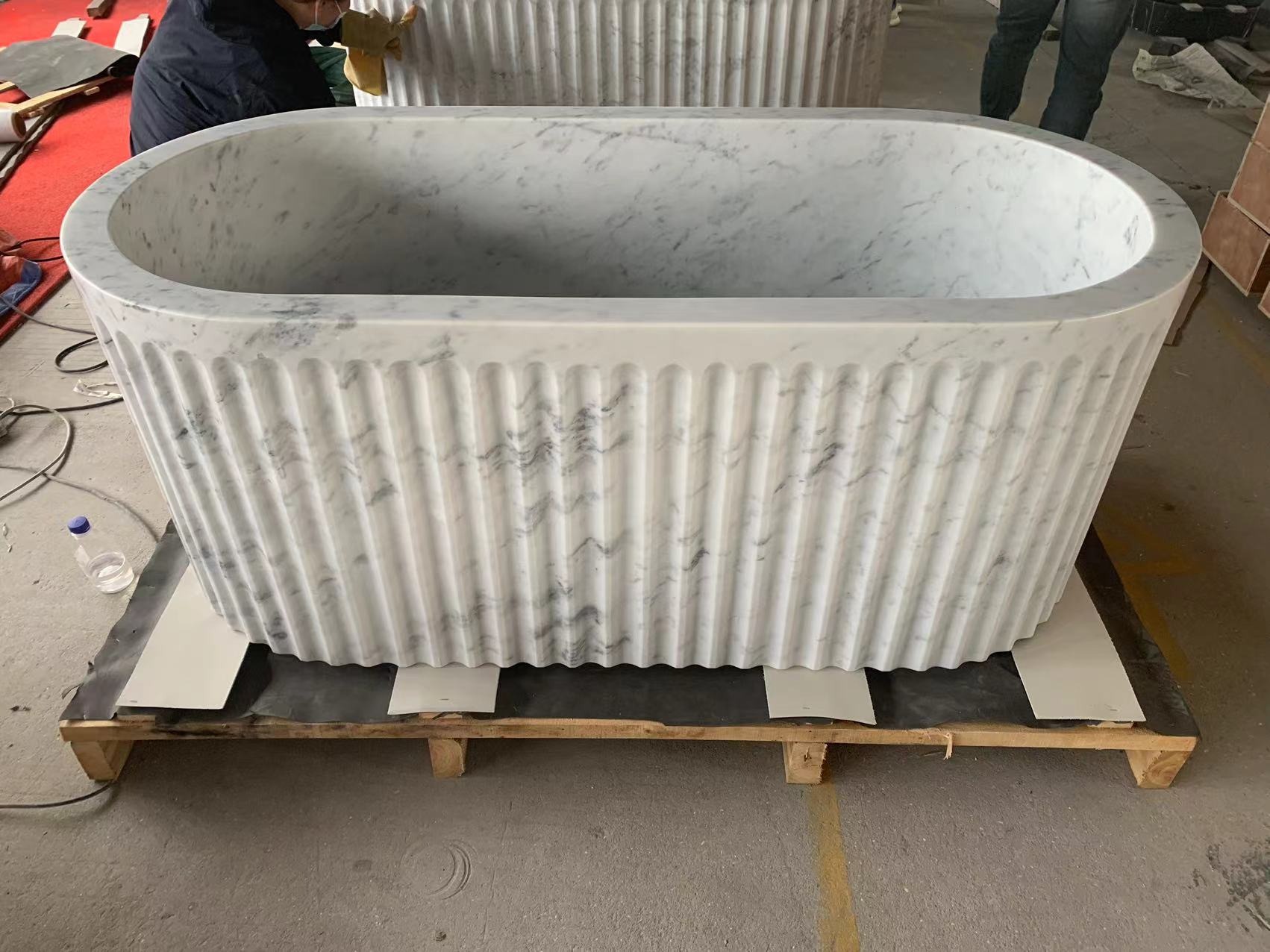 Luxury oval marble freestanding bathtub with modern floor-mounted faucet 369