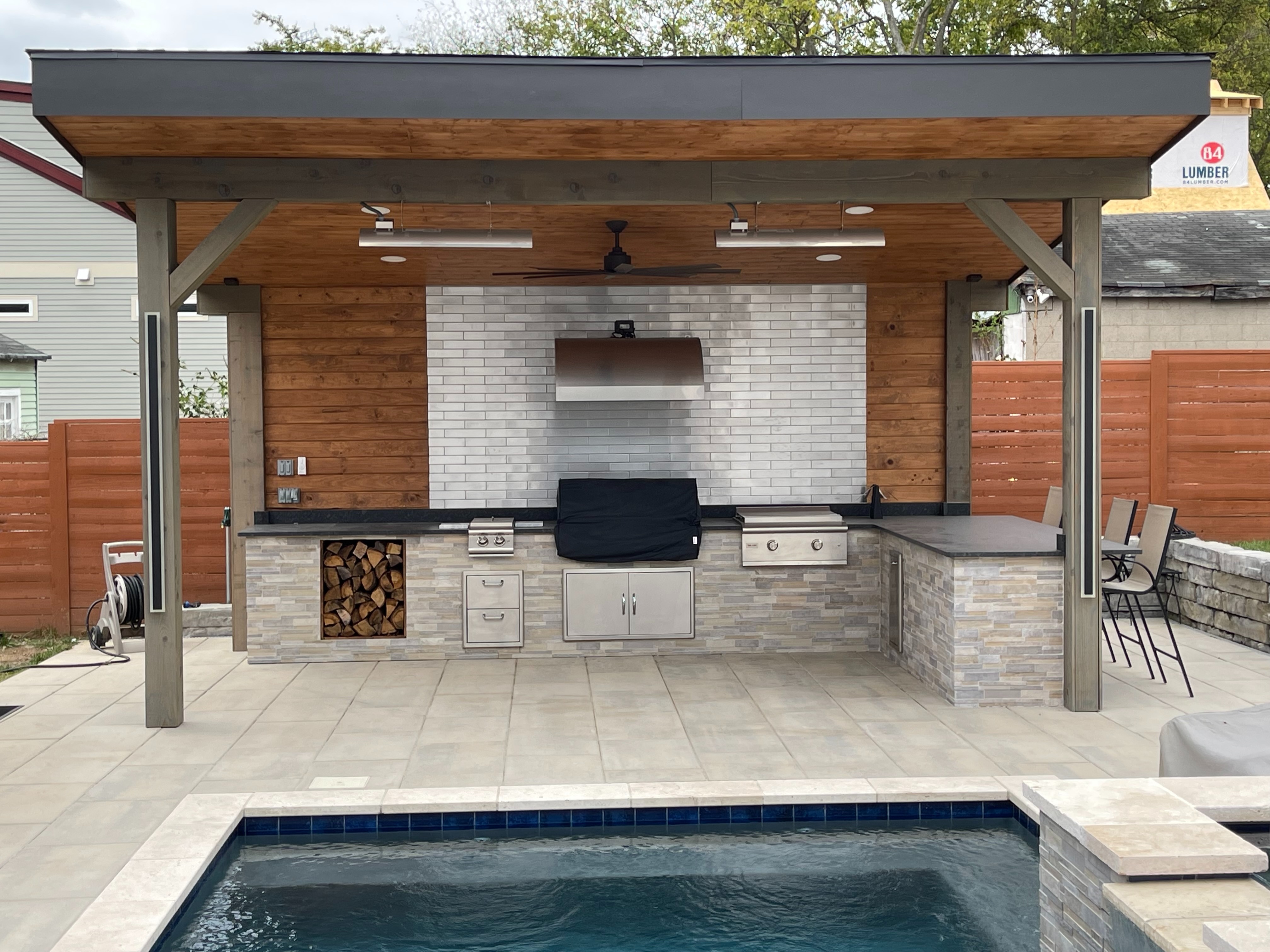 outdoor-kitchen-backsplash-in-nashville-by-stainless-steel-tile-2x12.jpg