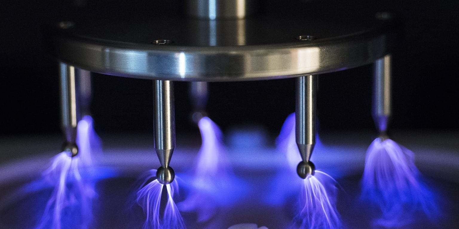 Corona treatment for improved coating adhesion 74