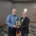 Jim Spichiger presenting the 2022 Quality Technician of the Year Award to Christopher Holloway 15276
