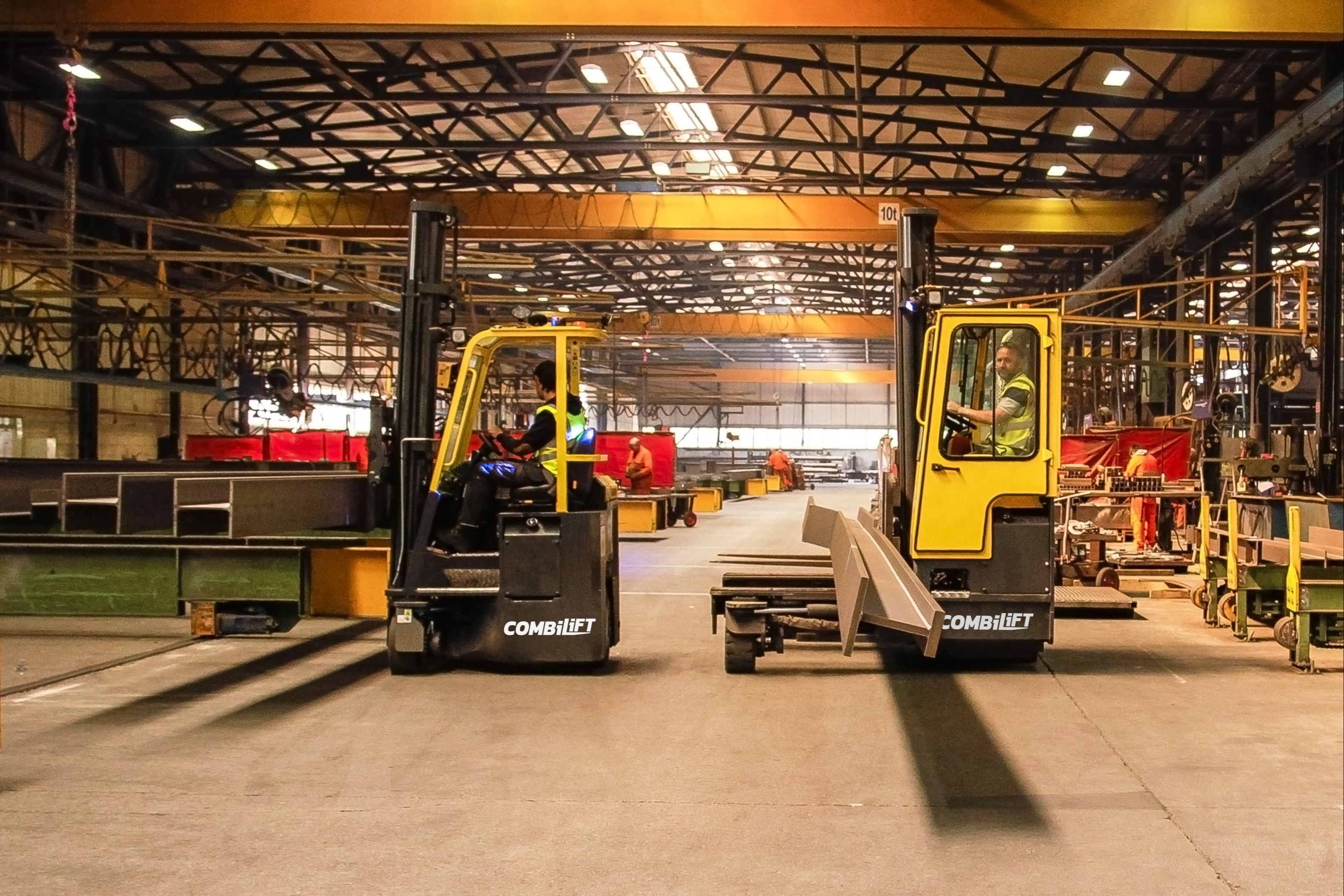 Multidirectional forklifts to handle long loads of steel - Combilift 1323