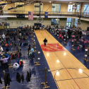 Photograph of the distribution floor were warm coats were given to area children who were in need of them for the upcoming winter season. 2996