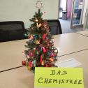 This &quot;Chemistree&quot; (Chemistry) contains 3D printed ornaments which were designed by SME Student Chapter members using SolidWorks parametric modeling software and then printed using the SME 3D printer. It consists of miniature beakers, flasks, graduated cylinders, and test tubes. The tree was given to a Chemistry tutor at NWTC who inspired many of them during their time as students at the school. 5739
